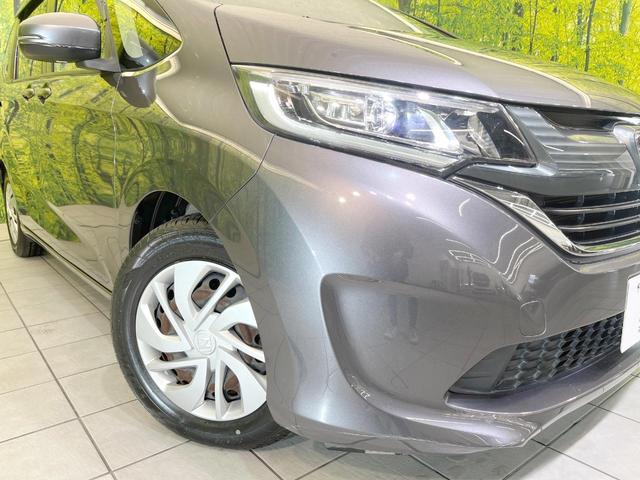 フリード Ｇ・ホンダセンシング　純正ナビ　両側電動ドア　バックカメラ　衝突被害軽減システム　レーダークルーズ　禁煙車　ドラレコ　スマートキー　ＬＥＤヘッド　ビルトインＥＴＣ　車線逸脱警報　オートライト　オートエアコン（12枚目）
