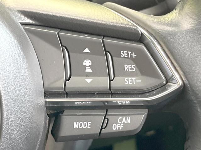 デミオ １３Ｓツーリング　Ｌパッケージ　バックカメラ　衝突被害軽減システム　レーダークルーズ　禁煙車　ハーフレザーシート　ドラレコ　コーナーセンサー　スマートキー　ＬＥＤヘッド　ＥＴＣ　純正１５インチアルミ　車線逸脱警報　オートライト（3枚目）