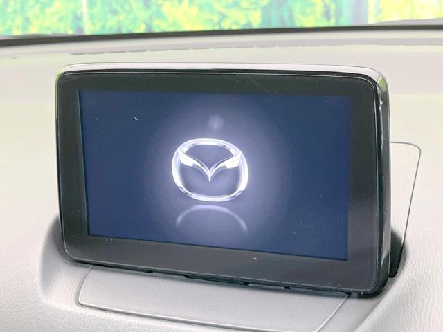 デミオ １３Ｓツーリング　Ｌパッケージ　バックカメラ　衝突被害軽減システム　レーダークルーズ　禁煙車　ハーフレザーシート　ドラレコ　コーナーセンサー　スマートキー　ＬＥＤヘッド　ＥＴＣ　純正１５インチアルミ　車線逸脱警報　オートライト（4枚目）