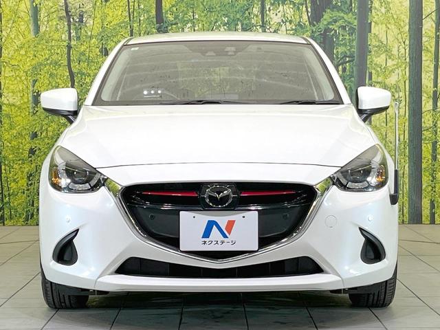 デミオ １３Ｓツーリング　Ｌパッケージ　バックカメラ　衝突被害軽減システム　レーダークルーズ　禁煙車　ハーフレザーシート　ドラレコ　コーナーセンサー　スマートキー　ＬＥＤヘッド　ＥＴＣ　純正１５インチアルミ　車線逸脱警報　オートライト（14枚目）