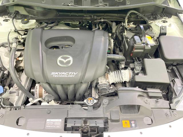 デミオ １３Ｓツーリング　Ｌパッケージ　バックカメラ　衝突被害軽減システム　レーダークルーズ　禁煙車　ハーフレザーシート　ドラレコ　コーナーセンサー　スマートキー　ＬＥＤヘッド　ＥＴＣ　純正１５インチアルミ　車線逸脱警報　オートライト（18枚目）