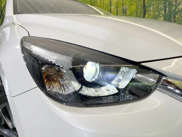 デミオ １３Ｓツーリング　Ｌパッケージ　バックカメラ　衝突被害軽減システム　レーダークルーズ　禁煙車　ハーフレザーシート　ドラレコ　コーナーセンサー　スマートキー　ＬＥＤヘッド　ＥＴＣ　純正１５インチアルミ　車線逸脱警報　オートライト（37枚目）