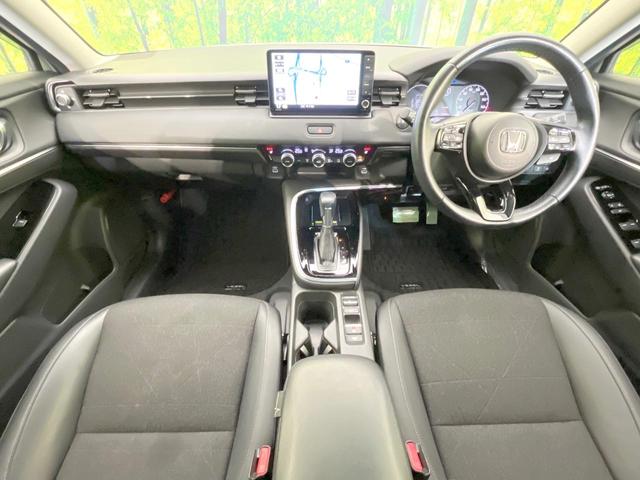 ヴェゼル ｅ：ＨＥＶ　Ｚ　純正９型ナビ　バックカメラ　衝突被害軽減システム　禁煙車　電動リアゲート　ハーフレザーシート　コーナーセンサー　ＬＥＤヘッド　ビルトインＥＴＣ　純正１８インチアルミ　車線逸脱警報　オートライト（2枚目）