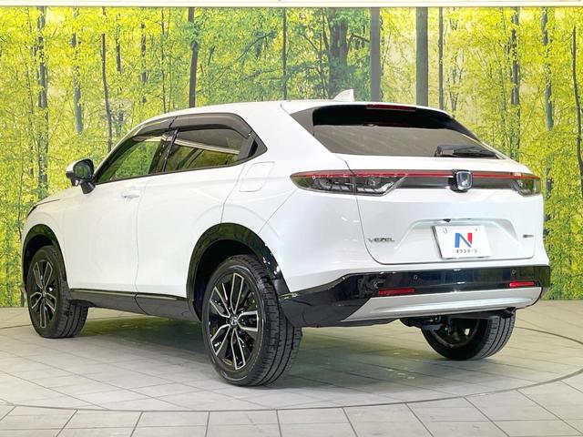 ヴェゼル ｅ：ＨＥＶ　Ｚ　純正９型ナビ　バックカメラ　衝突被害軽減システム　禁煙車　電動リアゲート　ハーフレザーシート　コーナーセンサー　ＬＥＤヘッド　ビルトインＥＴＣ　純正１８インチアルミ　車線逸脱警報　オートライト（24枚目）