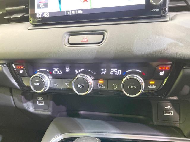 ヴェゼル ｅ：ＨＥＶ　Ｚ　純正９型ナビ　バックカメラ　衝突被害軽減システム　禁煙車　電動リアゲート　ハーフレザーシート　コーナーセンサー　ＬＥＤヘッド　ビルトインＥＴＣ　純正１８インチアルミ　車線逸脱警報　オートライト（63枚目）