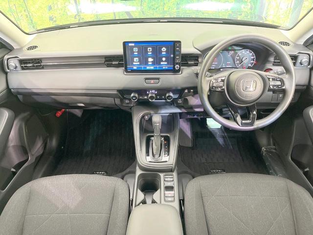 ヴェゼル ｅ：ＨＥＶ　Ｘ　禁煙車　純正９インチナビ　バックモニター　ＥＴＣ　ドライブレコーダー　レーダークルーズコントロール　ＬＥＤヘッド　クリアランスソナー　レーンアシスト　衝突被害軽減システム　オートエアコン　オートライト（2枚目）