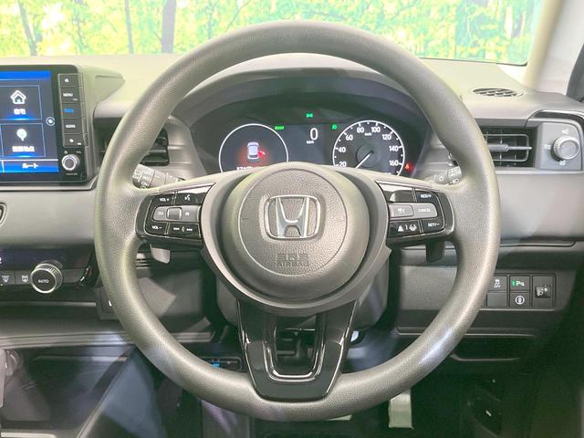 ヴェゼル ｅ：ＨＥＶ　Ｘ　禁煙車　純正９インチナビ　バックモニター　ＥＴＣ　ドライブレコーダー　レーダークルーズコントロール　ＬＥＤヘッド　クリアランスソナー　レーンアシスト　衝突被害軽減システム　オートエアコン　オートライト（11枚目）