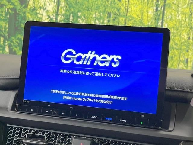 ステップワゴン e:HEVスパーダ 登録済未使用車 両側電動ドア バックカメラ 衝突被害軽減システム 電動リアゲート コーナーセンサー スマートキー LEDヘッド 純正16インチアルミ 車線逸脱警報 オートライト デュアルエアコン(3枚目)