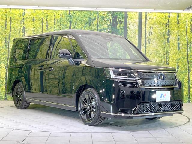 ステップワゴン e:HEVスパーダ 登録済未使用車 両側電動ドア バックカメラ 衝突被害軽減システム 電動リアゲート コーナーセンサー スマートキー LEDヘッド 純正16インチアルミ 車線逸脱警報 オートライト デュアルエアコン(17枚目)