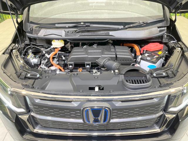 ステップワゴン e:HEVスパーダ 登録済未使用車 両側電動ドア バックカメラ 衝突被害軽減システム 電動リアゲート コーナーセンサー スマートキー LEDヘッド 純正16インチアルミ 車線逸脱警報 オートライト デュアルエアコン(19枚目)