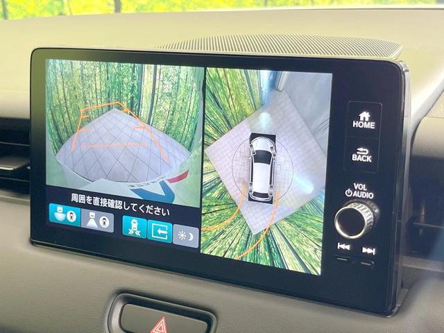 ヴェゼル ｅ：ＨＥＶ　Ｚ　登録済未使用車　全周囲カメラ　衝突被害軽減システム　電動リアゲート　ハーフレザーシート　スマートキー　ＬＥＤヘッド　ビルトインＥＴＣ　純正１８インチアルミ　オートハイビーム　車線逸脱警報（4枚目）