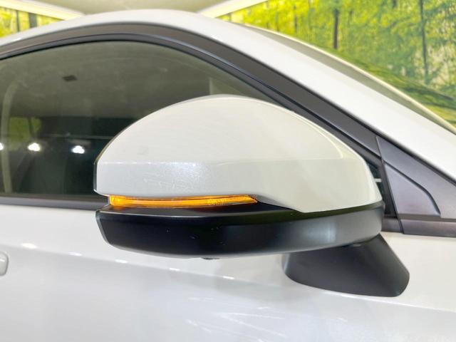 ヴェゼル ｅ：ＨＥＶ　Ｚ　登録済未使用車　全周囲カメラ　衝突被害軽減システム　電動リアゲート　ハーフレザーシート　スマートキー　ＬＥＤヘッド　ビルトインＥＴＣ　純正１８インチアルミ　オートハイビーム　車線逸脱警報（34枚目）