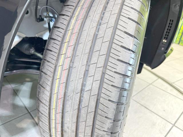 ヴェゼル ｅ：ＨＥＶ　Ｚ　登録済未使用車　全周囲カメラ　衝突被害軽減システム　電動リアゲート　ハーフレザーシート　スマートキー　ＬＥＤヘッド　ビルトインＥＴＣ　純正１８インチアルミ　オートハイビーム　車線逸脱警報（35枚目）