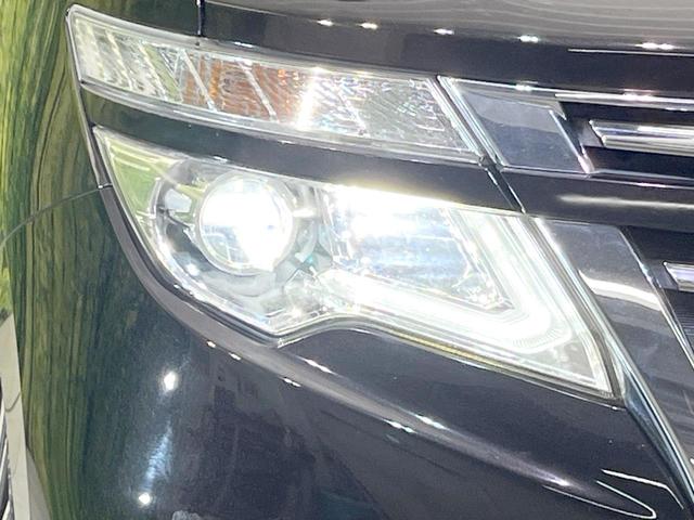 エルグランド 250ハイウェイスター 両側電動 純正8型ナビ フリップダウンモニター バックカメラ 禁煙車 スマートキー HIDヘッド ビルトインETC クルコン 純正18インチアルミ オートライト デュアルエアコン リアエアコン(28枚目)