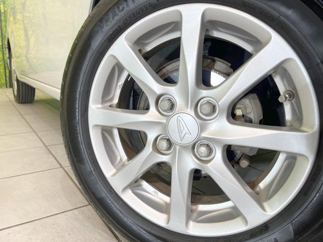 ムーヴ Xリミテッド 4WD 禁煙車 純正SDナビ バックカメラ スマートキー ETC 純正14インチアルミ オートエアコン CD 地デジ(13枚目)