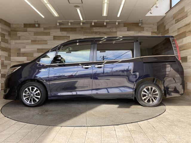 エスクァイア ハイブリッドGi プレミアムパッケージ 純正10型ナビ/フリップダウンモニター/両側電動スライドドア/衝突軽減ブレーキ/シートヒーター/ハーフレザーシート/クルーズコントロール/ビルトインETC/レーンキープ/スマートキー/バックカメラ(25枚目)