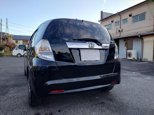 フィットハイブリッド ハイブリッド・10thアニバーサリー 1.3 10thアニバーサリー 下取り車 ナビ Bカメラ ETC ドラレコ TV オートクルーズコントロール スマートキー 盗難防止システム 衝突安全ボディ アルミホイール CD DVD USB(14枚目)