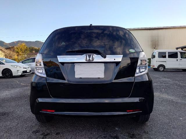 フィットハイブリッド ハイブリッド・10thアニバーサリー 1.3 10thアニバーサリー 下取り車 ナビ Bカメラ ETC ドラレコ TV オートクルーズコントロール スマートキー 盗難防止システム 衝突安全ボディ アルミホイール CD DVD USB(16枚目)