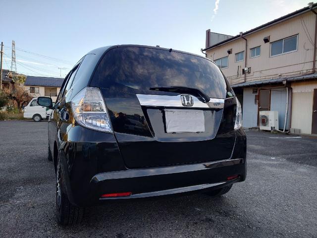 フィットハイブリッド ハイブリッド・10thアニバーサリー 1.3 10thアニバーサリー 下取り車 ナビ Bカメラ ETC ドラレコ TV オートクルーズコントロール スマートキー 盗難防止システム 衝突安全ボディ アルミホイール CD DVD USB(21枚目)