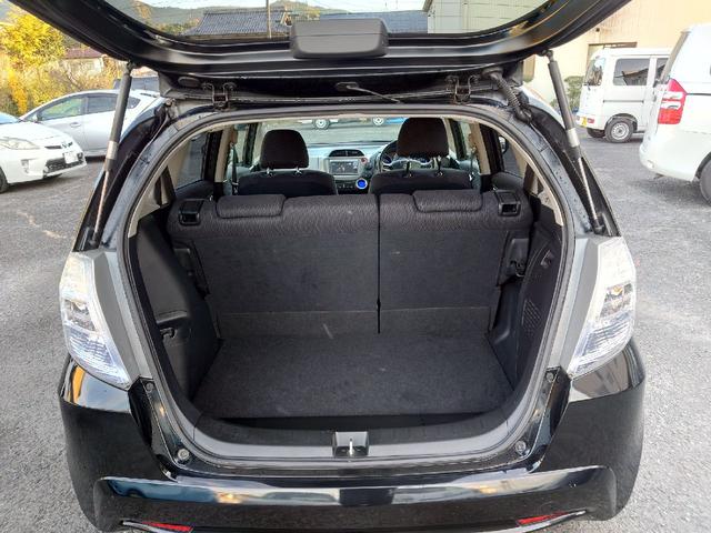 フィットハイブリッド ハイブリッド・10thアニバーサリー 1.3 10thアニバーサリー 下取り車 ナビ Bカメラ ETC ドラレコ TV オートクルーズコントロール スマートキー 盗難防止システム 衝突安全ボディ アルミホイール CD DVD USB(24枚目)