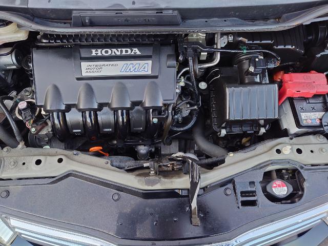 フィットハイブリッド ハイブリッド・10thアニバーサリー 1.3 10thアニバーサリー 下取り車 ナビ Bカメラ ETC ドラレコ TV オートクルーズコントロール スマートキー 盗難防止システム 衝突安全ボディ アルミホイール CD DVD USB(26枚目)