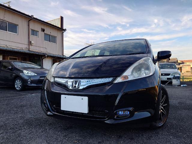 フィットハイブリッド ハイブリッド・10thアニバーサリー 1.3 10thアニバーサリー 下取り車 ナビ Bカメラ ETC ドラレコ TV オートクルーズコントロール スマートキー 盗難防止システム 衝突安全ボディ アルミホイール CD DVD USB(31枚目)