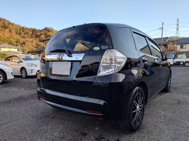 フィットハイブリッド ハイブリッド・10thアニバーサリー 1.3 10thアニバーサリー 下取り車 ナビ Bカメラ ETC ドラレコ TV オートクルーズコントロール スマートキー 盗難防止システム 衝突安全ボディ アルミホイール CD DVD USB(34枚目)