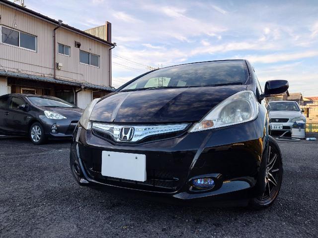 フィットハイブリッド ハイブリッド・10thアニバーサリー 1.3 10thアニバーサリー 下取り車 ナビ Bカメラ ETC ドラレコ TV オートクルーズコントロール スマートキー 盗難防止システム 衝突安全ボディ アルミホイール CD DVD USB(36枚目)