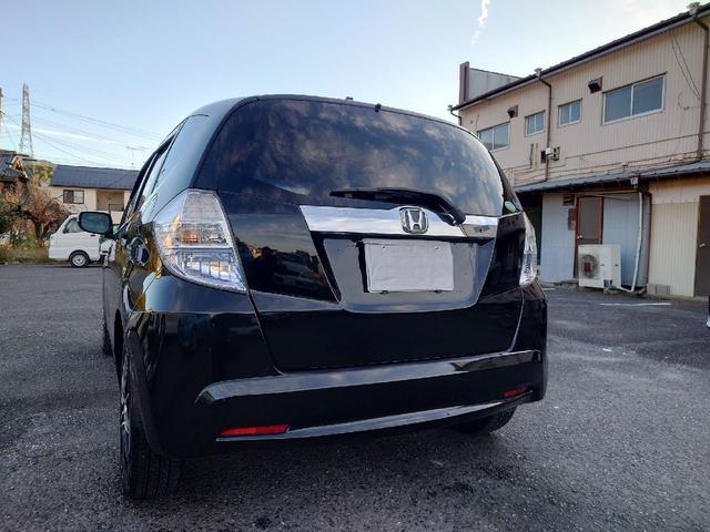 フィットハイブリッド ハイブリッド・10thアニバーサリー 1.3 10thアニバーサリー 下取り車 ナビ Bカメラ ETC ドラレコ TV オートクルーズコントロール スマートキー 盗難防止システム 衝突安全ボディ アルミホイール CD DVD USB(37枚目)