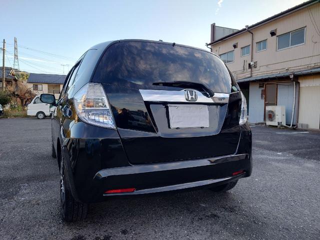 フィットハイブリッド ハイブリッド・10thアニバーサリー 1.3 10thアニバーサリー 下取り車 ナビ Bカメラ ETC ドラレコ TV オートクルーズコントロール スマートキー 盗難防止システム 衝突安全ボディ アルミホイール CD DVD USB(54枚目)