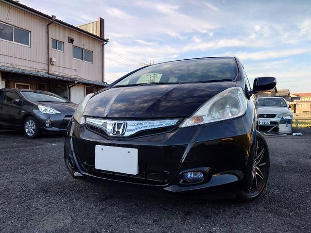 フィットハイブリッド ハイブリッド・10thアニバーサリー 1.3 10thアニバーサリー 下取り車 ナビ Bカメラ ETC ドラレコ TV オートクルーズコントロール スマートキー 盗難防止システム 衝突安全ボディ アルミホイール CD DVD USB(55枚目)