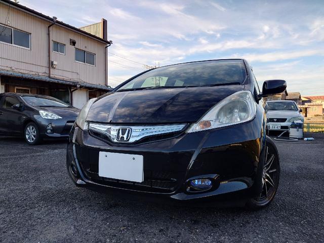 フィットハイブリッド ハイブリッド・10thアニバーサリー 1.3 10thアニバーサリー 下取り車 ナビ Bカメラ ETC ドラレコ TV オートクルーズコントロール スマートキー 盗難防止システム 衝突安全ボディ アルミホイール CD DVD USB(59枚目)