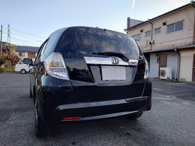 フィットハイブリッド ハイブリッド・10thアニバーサリー 1.3 10thアニバーサリー 下取り車 ナビ Bカメラ ETC ドラレコ TV オートクルーズコントロール スマートキー 盗難防止システム 衝突安全ボディ アルミホイール CD DVD USB(61枚目)