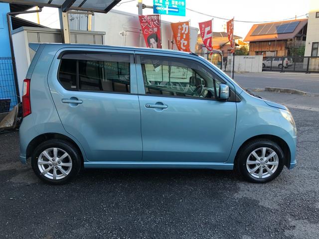 ワゴンＲ ＦＸリミテッド　禁煙車　新品タイヤ　プッシュスタート　社外地デジナビ　バックカメラ　スマートキー　オートエアコン　１４インチアルミホイール　アイドリングストップ　ヘッドライトレベライザー（16枚目）