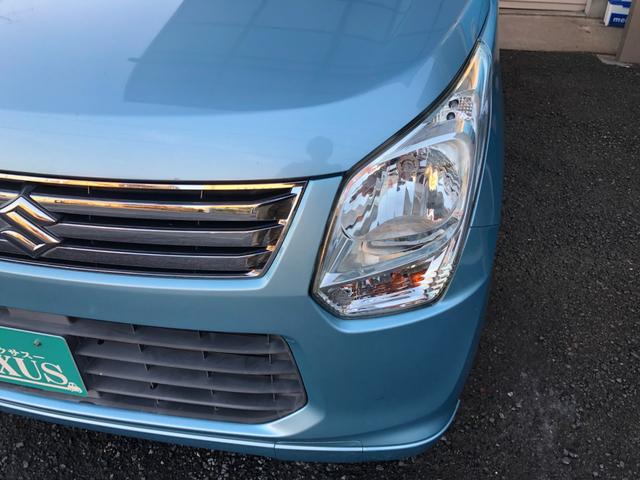 ワゴンＲ ＦＸリミテッド　禁煙車　新品タイヤ　プッシュスタート　社外地デジナビ　バックカメラ　スマートキー　オートエアコン　１４インチアルミホイール　アイドリングストップ　ヘッドライトレベライザー（19枚目）