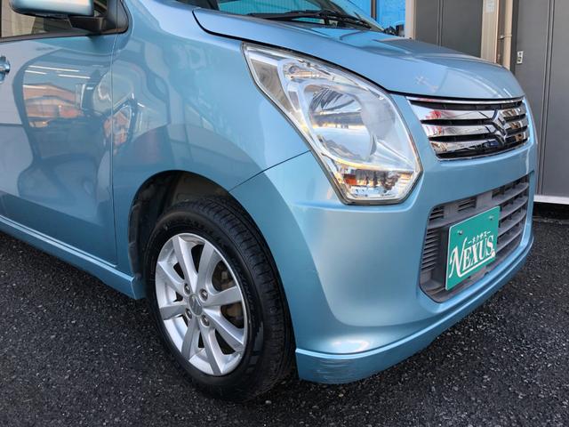 ワゴンＲ ＦＸリミテッド　禁煙車　新品タイヤ　プッシュスタート　社外地デジナビ　バックカメラ　スマートキー　オートエアコン　１４インチアルミホイール　アイドリングストップ　ヘッドライトレベライザー（20枚目）