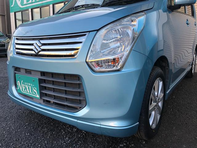 ワゴンＲ ＦＸリミテッド　禁煙車　新品タイヤ　プッシュスタート　社外地デジナビ　バックカメラ　スマートキー　オートエアコン　１４インチアルミホイール　アイドリングストップ　ヘッドライトレベライザー（21枚目）