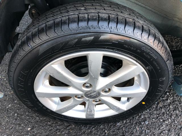 ワゴンＲ ＦＸリミテッド　禁煙車　新品タイヤ　プッシュスタート　社外地デジナビ　バックカメラ　スマートキー　オートエアコン　１４インチアルミホイール　アイドリングストップ　ヘッドライトレベライザー（52枚目）