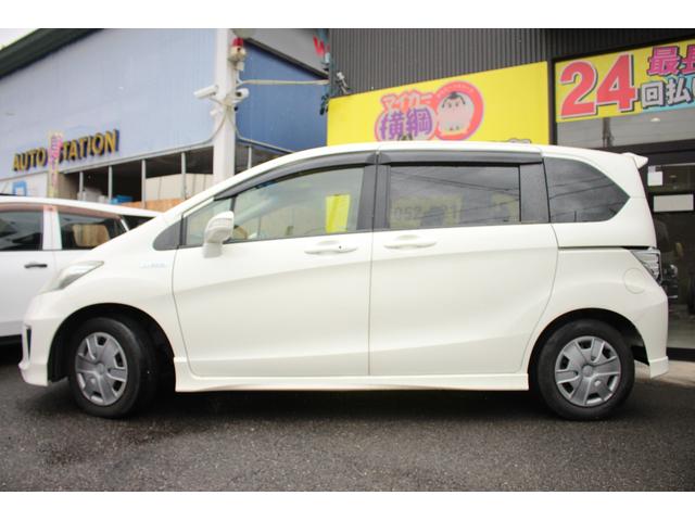 フリードハイブリッド ジャストセレクション セキュリティー 横滑り防止機能 衝突安全ボディ オートクルーズ エアバック ウォークスルー キーレスエントリー PS フルオートエアコン ABS パワーウィンドウ 運転席助手席エアバック(8枚目)