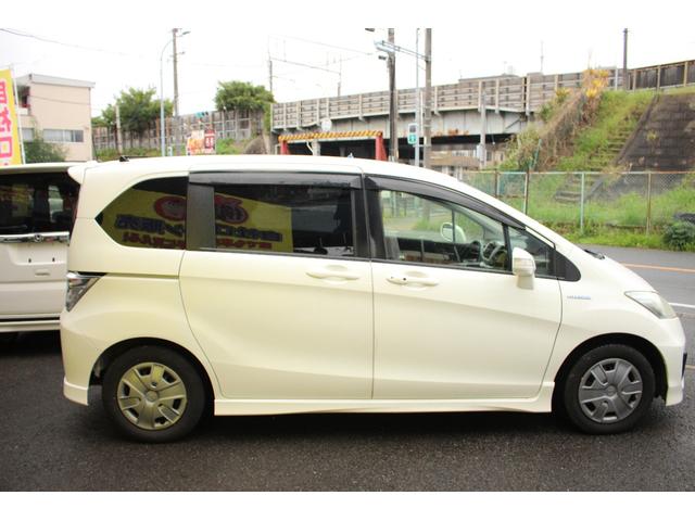 フリードハイブリッド ジャストセレクション セキュリティー 横滑り防止機能 衝突安全ボディ オートクルーズ エアバック ウォークスルー キーレスエントリー PS フルオートエアコン ABS パワーウィンドウ 運転席助手席エアバック(10枚目)