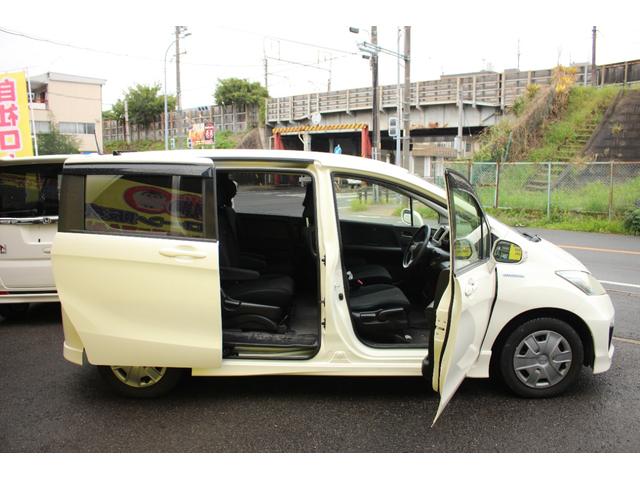 フリードハイブリッド ジャストセレクション セキュリティー 横滑り防止機能 衝突安全ボディ オートクルーズ エアバック ウォークスルー キーレスエントリー PS フルオートエアコン ABS パワーウィンドウ 運転席助手席エアバック(11枚目)