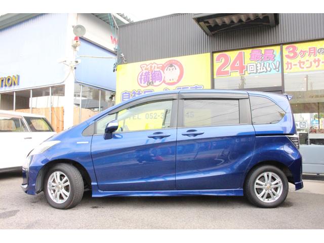 フリードハイブリッド ジャストセレクション セキュリティー 横滑り防止機能 衝突安全ボディ オートクルーズ エアバック ウォークスルー キーレスエントリー PS フルオートエアコン ABS パワーウィンドウ 運転席助手席エアバック(8枚目)