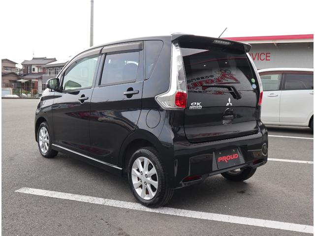 ｅＫカスタム Ｇ　１年保証付　車検令和８年９月迄　走行３１千Ｋｍ　バックカメラ　ＥＴＣ　純正オーディオ　ＣＤ再生　ラジオ　ＨＩＤヘッドライト　スマートキー　プッシュスタート　アイドリングストップ　ユーザー買取車（9枚目）