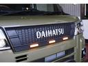 　新車コンプリート　リフトアップカスタム　バンパーガード　１４インチアルミ　オフロードタイヤ　マッドフラップ　ＬＥＤマーカー　ＤＡＩＨＡＴＵグリル　ウッドハンドル　純正９インチＤＰオーディオ（10枚目）