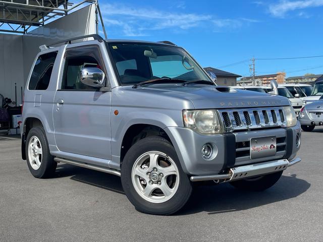 パジェロミニ ＶＲ　４ＷＤ　ＥＴＣ　ＴＶ　キーレスエントリー　電動格納ミラー　ＭＴ　盗難防止システム　ＡＢＳ　ＣＤ　ＤＶＤ再生　ルーフレール　アルミホイール　衝突安全ボディ　エアコン　パワーステアリング　パワーウィンドウ（13枚目）