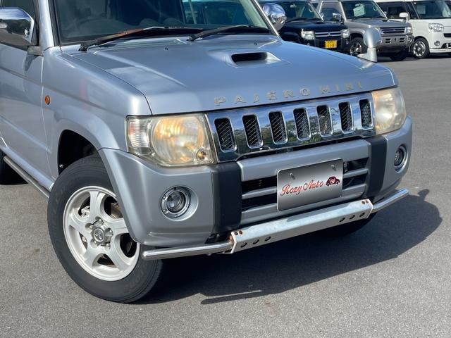 パジェロミニ ＶＲ　４ＷＤ　ＥＴＣ　ＴＶ　キーレスエントリー　電動格納ミラー　ＭＴ　盗難防止システム　ＡＢＳ　ＣＤ　ＤＶＤ再生　ルーフレール　アルミホイール　衝突安全ボディ　エアコン　パワーステアリング　パワーウィンドウ（22枚目）