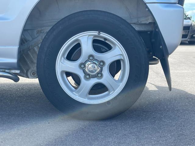 パジェロミニ ＶＲ　４ＷＤ　ＥＴＣ　ＴＶ　キーレスエントリー　電動格納ミラー　ＭＴ　盗難防止システム　ＡＢＳ　ＣＤ　ＤＶＤ再生　ルーフレール　アルミホイール　衝突安全ボディ　エアコン　パワーステアリング　パワーウィンドウ（31枚目）