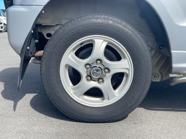 パジェロミニ ＶＲ　４ＷＤ　ＥＴＣ　ＴＶ　キーレスエントリー　電動格納ミラー　ＭＴ　盗難防止システム　ＡＢＳ　ＣＤ　ＤＶＤ再生　ルーフレール　アルミホイール　衝突安全ボディ　エアコン　パワーステアリング　パワーウィンドウ（33枚目）
