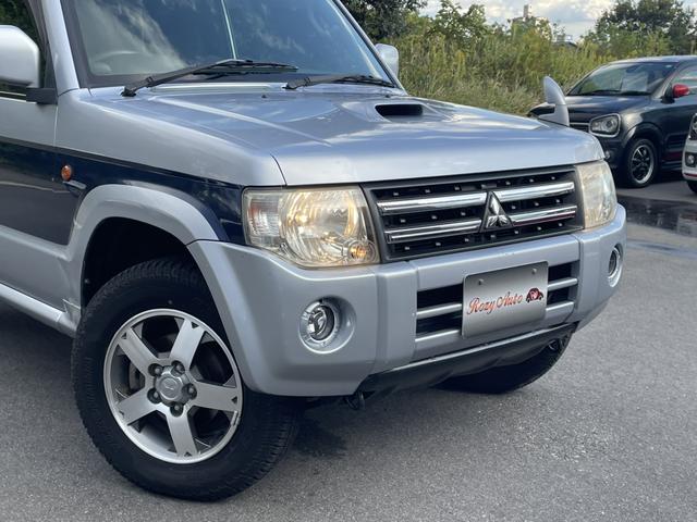 パジェロミニ ＶＲ　４ＷＤ　ＥＴＣ　ナビ　キーレスエントリー　電動格納ミラー　ＡＴ　盗難防止システム　ＡＢＳ　ＣＤ　ルーフレール　アルミホイール　衝突安全ボディ　エアコン　パワーステアリング　パワーウィンドウ（22枚目）