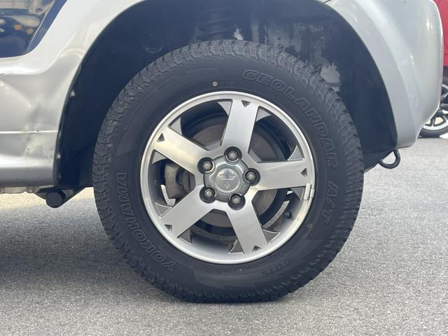 パジェロミニ ＶＲ　４ＷＤ　ＥＴＣ　ナビ　キーレスエントリー　電動格納ミラー　ＡＴ　盗難防止システム　ＡＢＳ　ＣＤ　ルーフレール　アルミホイール　衝突安全ボディ　エアコン　パワーステアリング　パワーウィンドウ（24枚目）